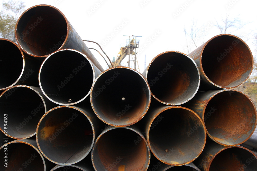 Close-up of steel high-pressure pipes bunch in warehouse Close-up of steel high-pressure pipes bunch in warehouse