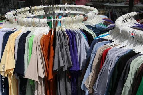 Racks of T-shirts outside store © Spiroview Inc.