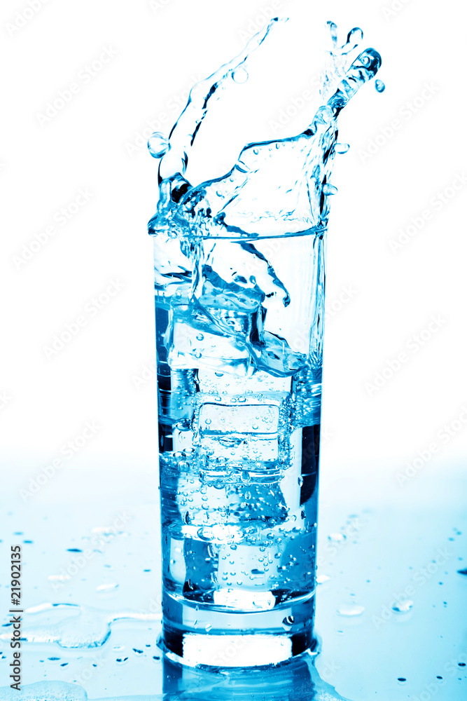 water splashing in glass isolated water splashing in glass isolated