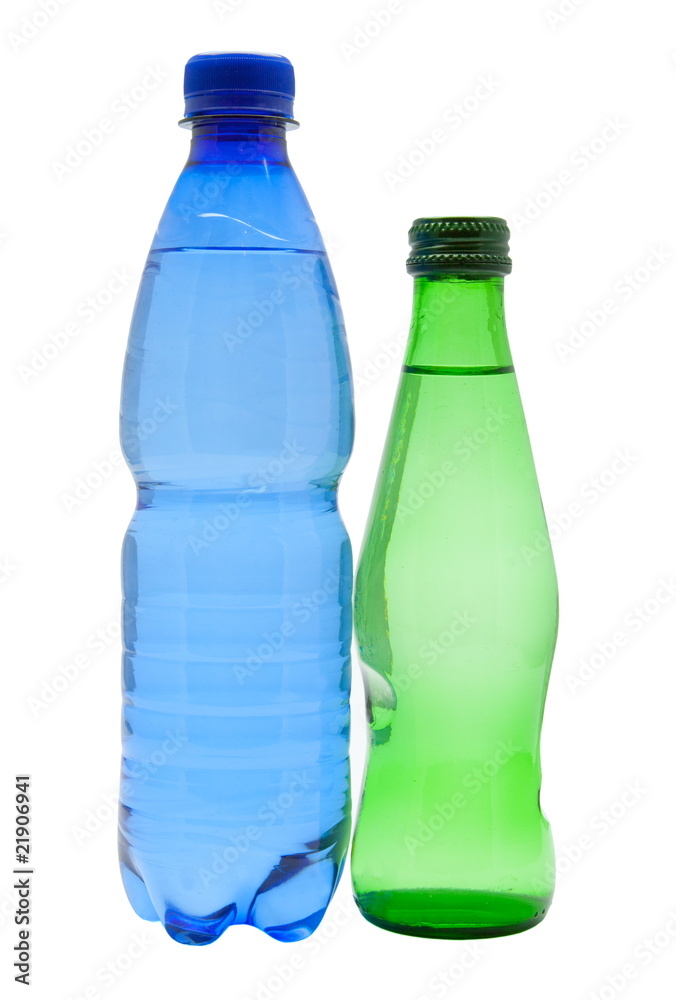 Bottles of water isolated on the white Bottles of water isolated on the white