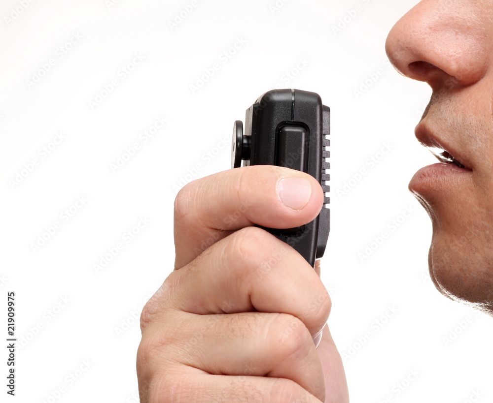 Man talking on CB Radio microphone Stock Photo | Adobe Stock