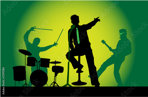 The three musicians on stage - a concert, green background