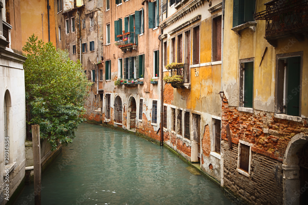 Old buildings on canal in Venice
