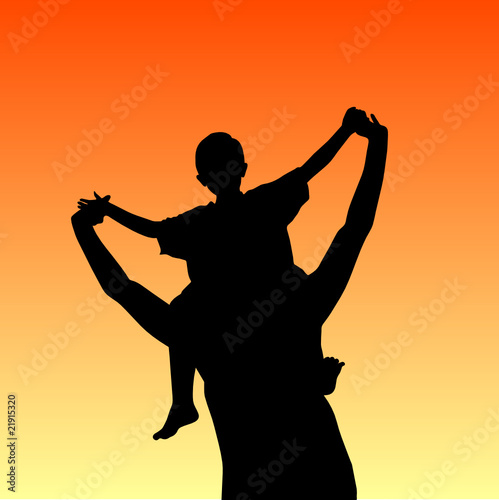 father carrying son on his shoulders