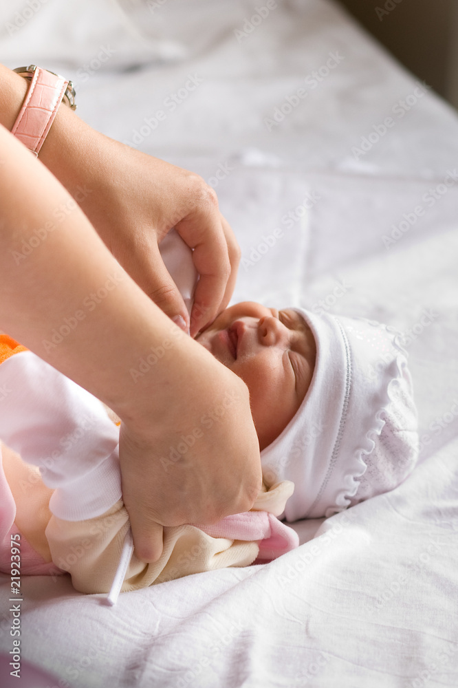 White newborn in mother hands White newborn in mother hands