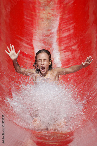 Girl on a water slide photo