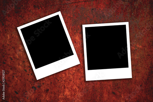 red rusty metal background with polaroids