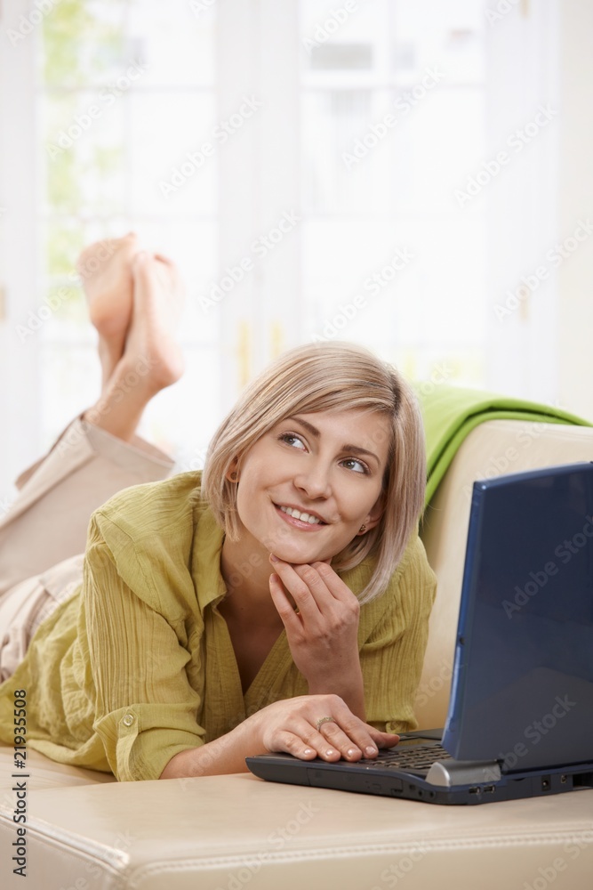Woman chatting online on computer Woman chatting online on computer