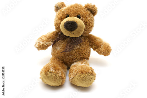 Toy brown soft bear isolated on white background