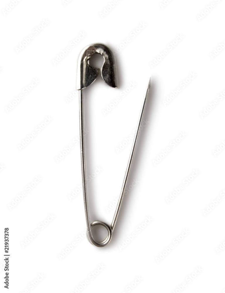 Safety pin isolated on the white background Safety pin isolated on the white background