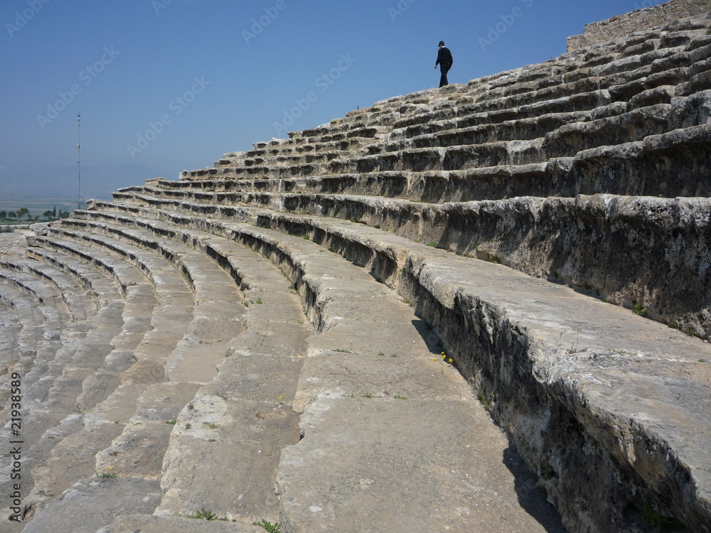 hierapolis stone amphitheater stadium with man in background for scale