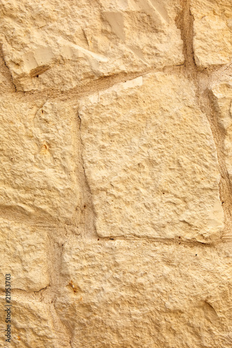 Limestone wall close view with visible texture.