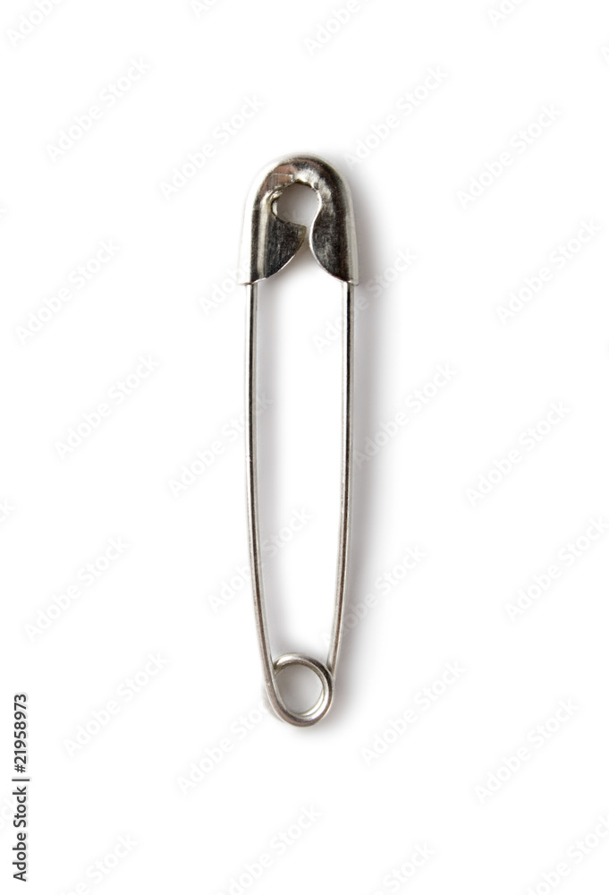 Safety pin isolated on the white background Safety pin isolated on the white background