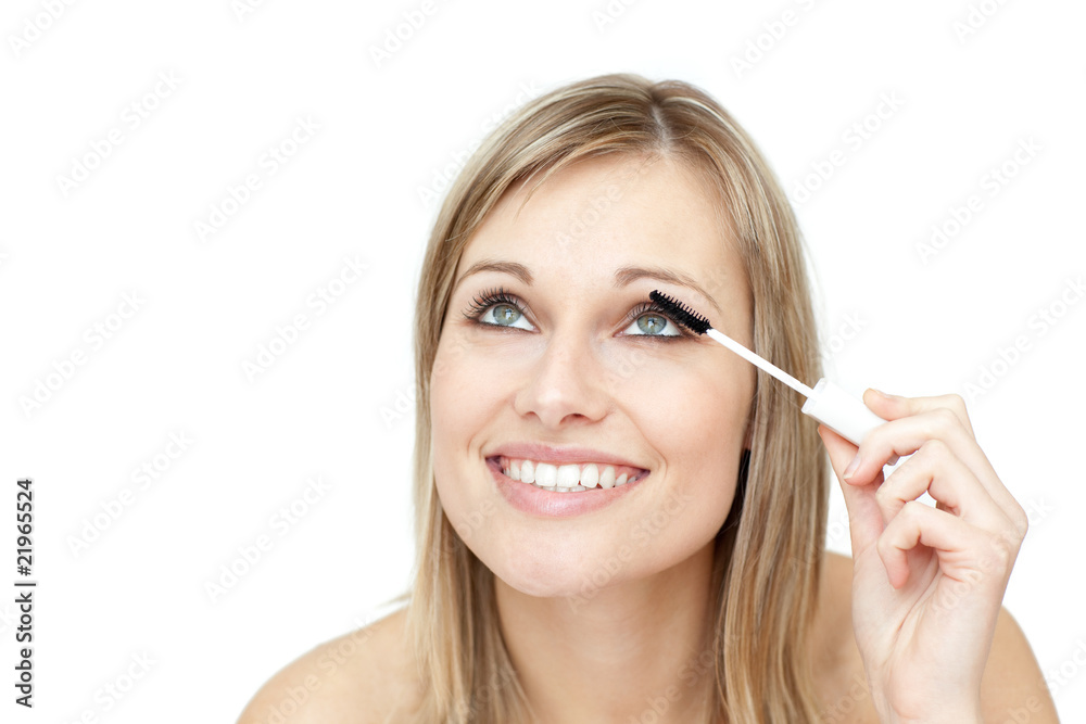 Fototapeta premium Jolly woman putting mascara