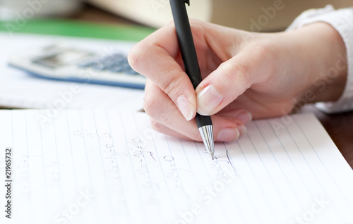 Close-up of a student doing her homework