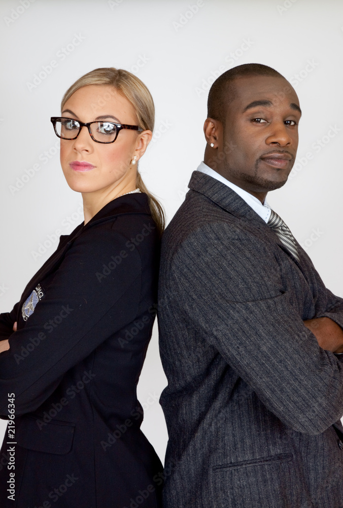 Mixed race couple with arms crossed Mixed race couple with arms crossed