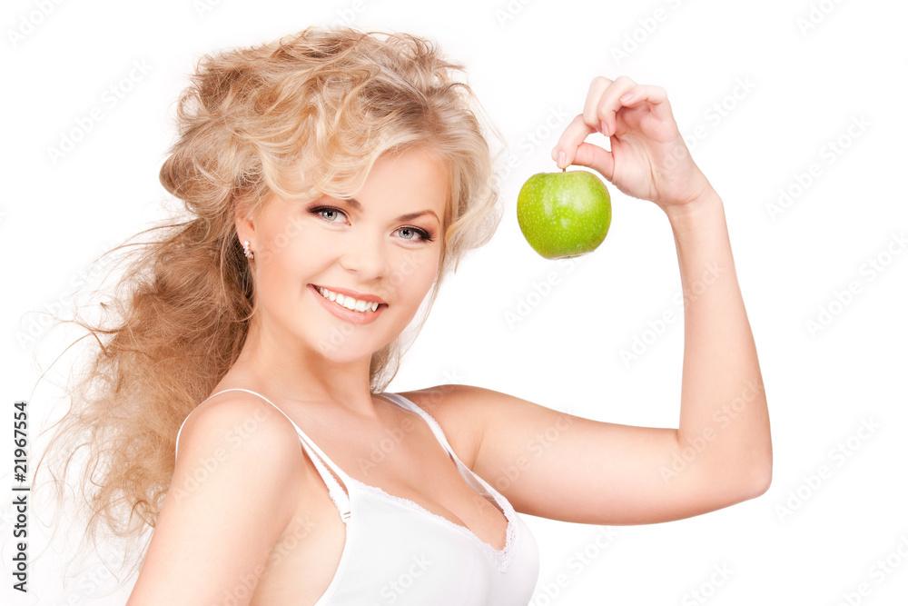 young beautiful woman with green apple young beautiful woman with green apple