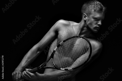 Tennis player with racket © Fisher Photostudio