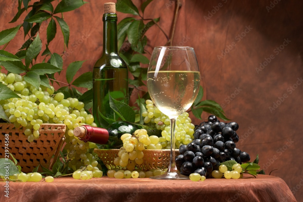 White dry wine, fresh clusters of a grapes