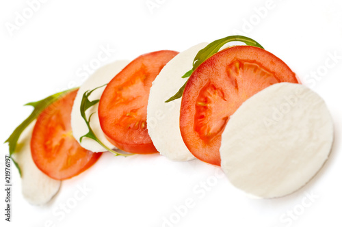 mozzarella cheese and tomatoes on a plate