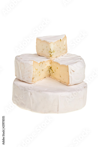 Stacked round cheese blocks.
