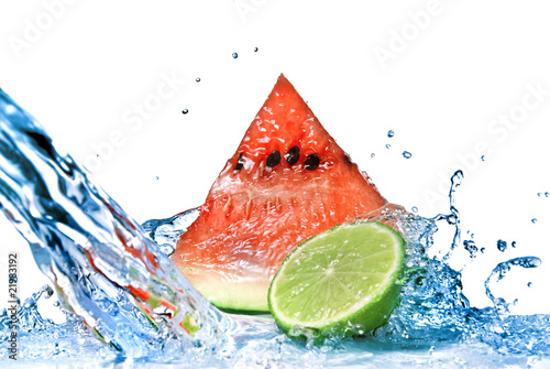 watermelon with lime and water splash isolated on white