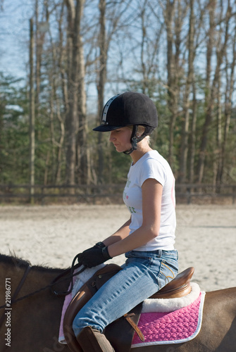 Young Woman Equestrian Training