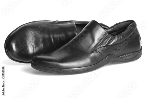 New leather men shoes isolated on white background © natavin