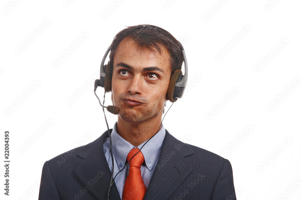 young call center man talking by the phone young call center man talking by the phone