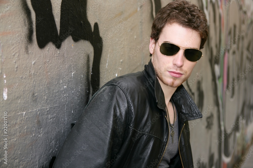 Obraz premium rocker rock star young man sunglasses