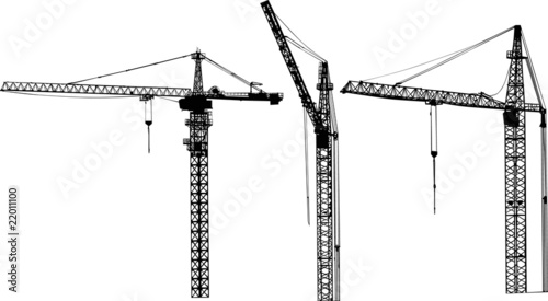 three isolated black building cranes