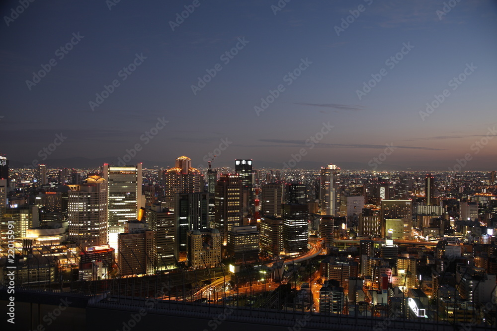 Illuminated Osaka City in Japan at night from high above