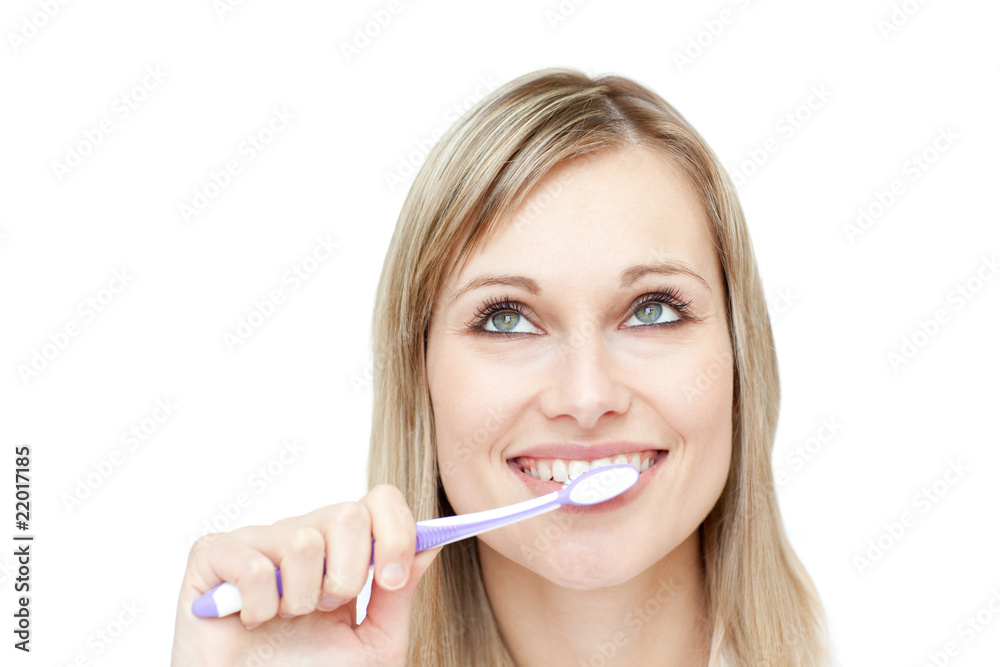 Portrait of an attractive woman brushing her teeth Portrait of an attractive woman brushing her teeth
