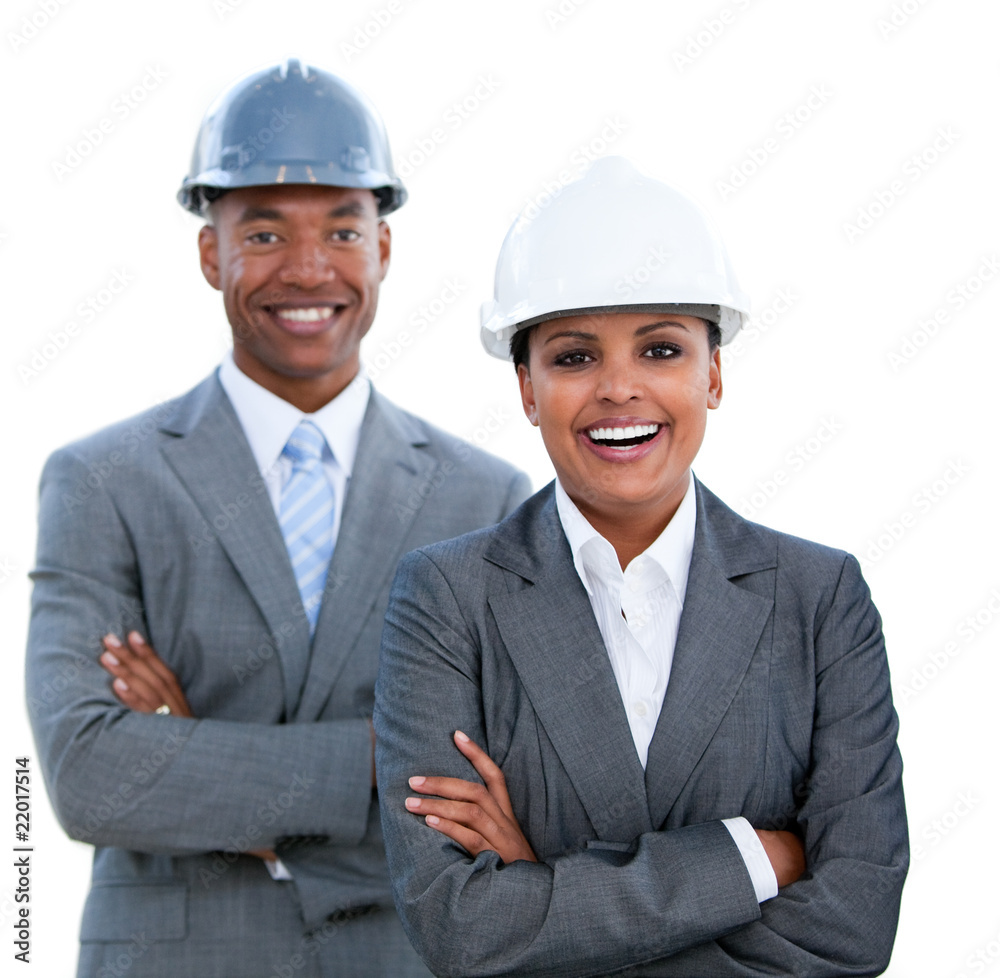 Portrait of two ethnic architects with crossed arms Portrait of two ethnic architects with crossed arms