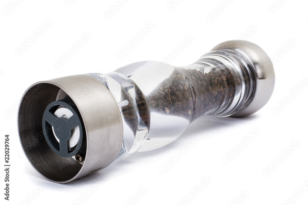 glass grinder of pepper isolated on a white background glass grinder of pepper isolated on a white background