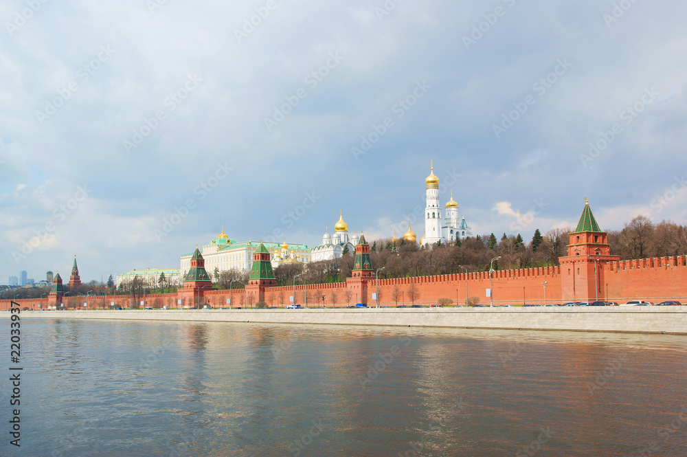 Moscow Kremlin, river under dramatic sky