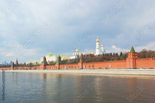 Moscow Kremlin, river under dramatic sky