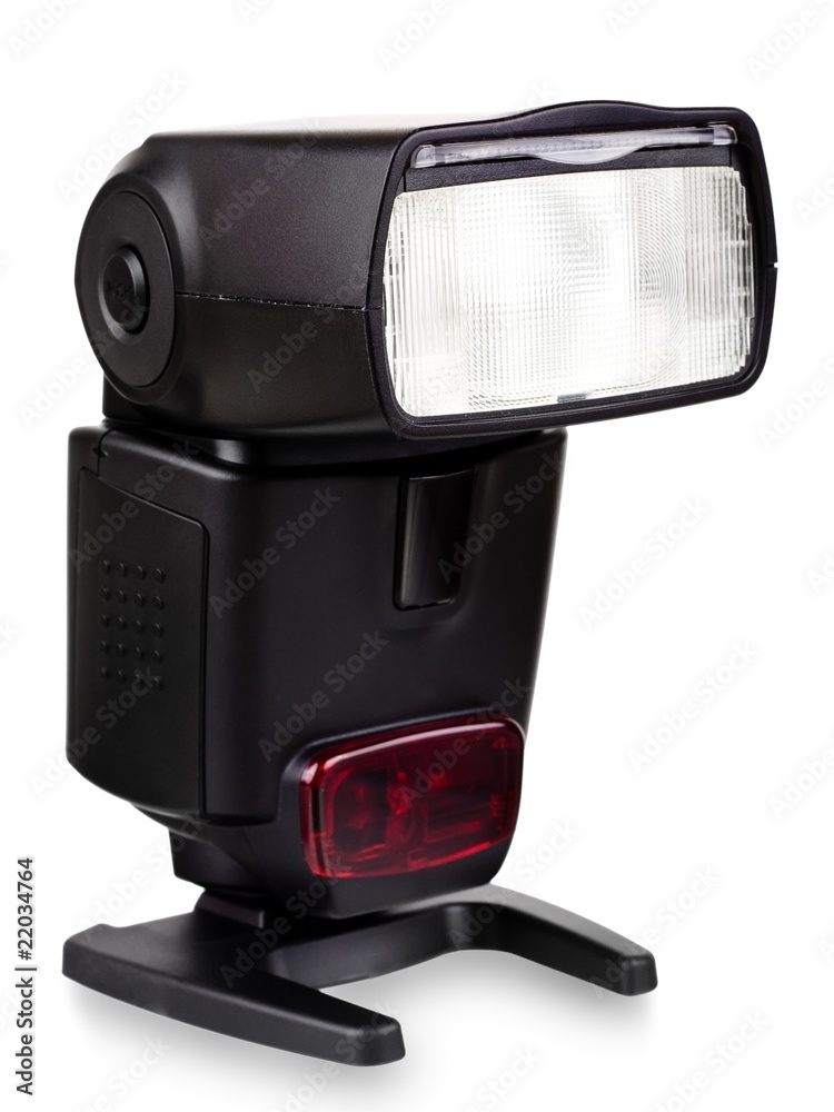 Photo of the camera flashgun isolated on the white Photo of the camera flashgun isolated on the white