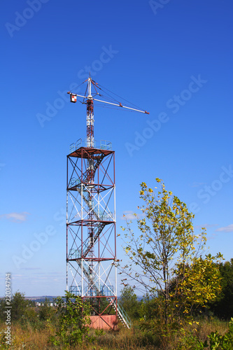 Parachute tower for educational jumps of commandoes with a parac photo