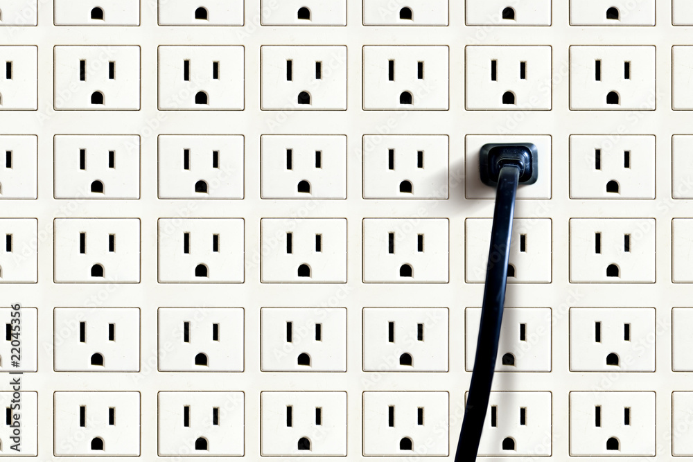 Wall sockets and plug to represent selectivity. Stock Photo | Adobe Stock