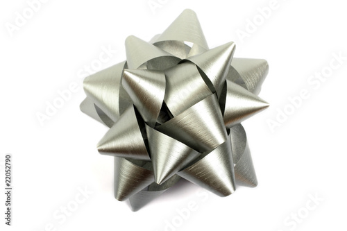 Silver gift bow isolated on white background shiny metallic ribbon present decoration silvr