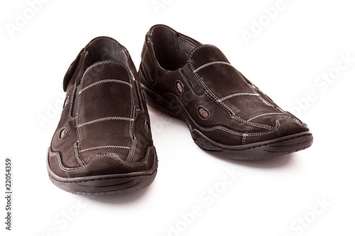 Pair of man's black shoes isolated on white background