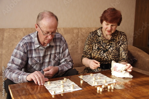 Mature couple playing a board game