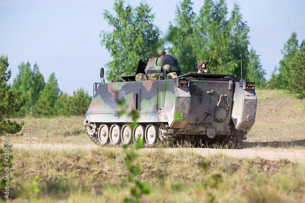 Fototapeta premium M113 troop-carrier awaiting orders to engage