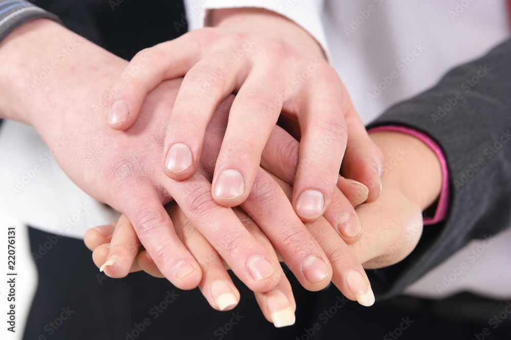 Image of different people shaking their hands together Image of different people shaking their hands together