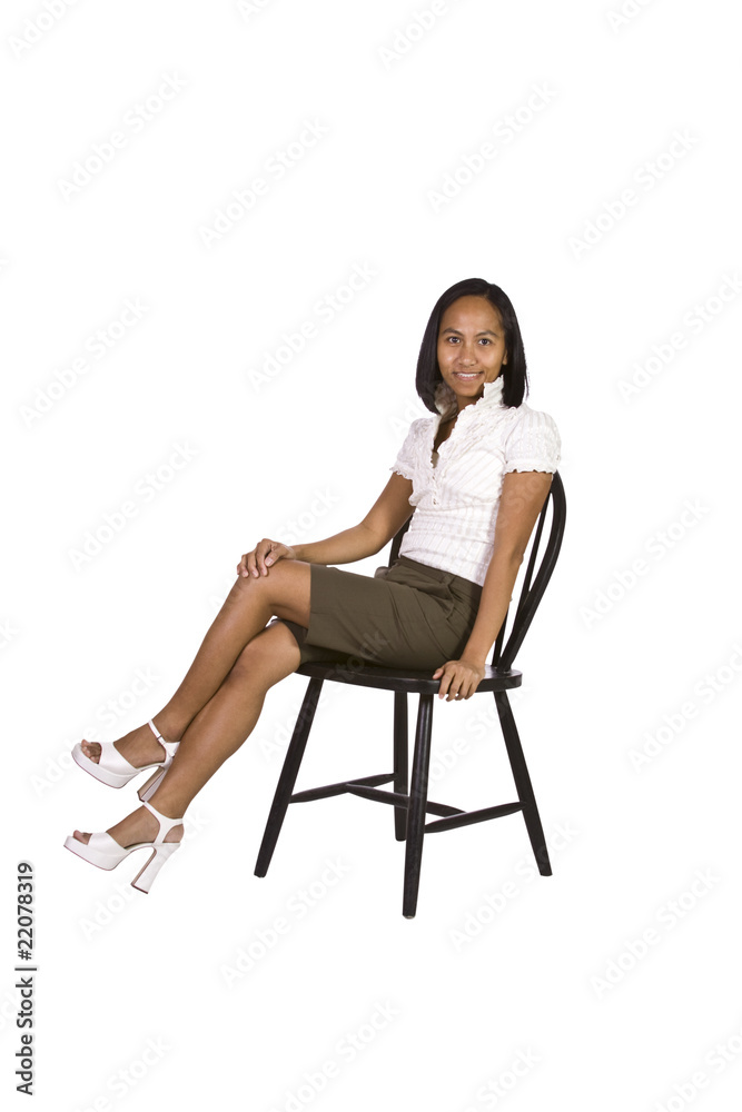 Artistic Image of a Woman Sitting on a Chair Artistic Image of a Woman Sitting on a Chair