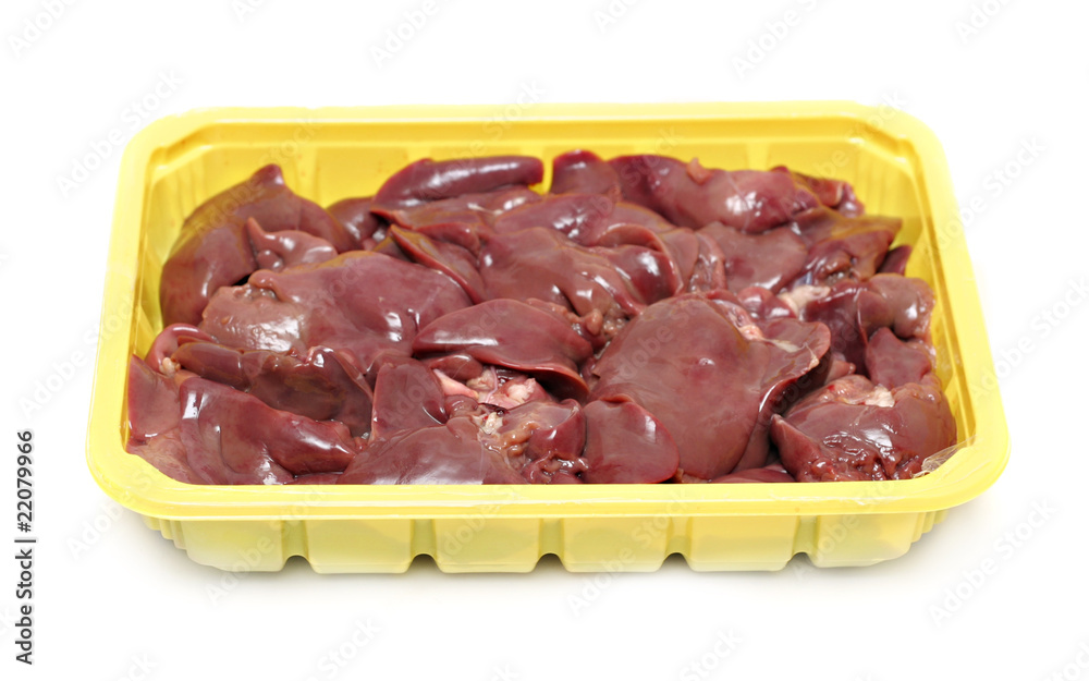 Raw liver in the plastic plate isolated