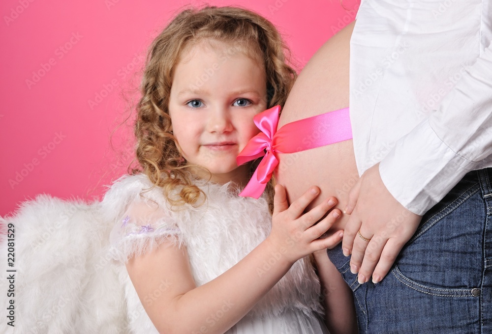 Angel girl and beautiful pregnant belly Angel girl and beautiful pregnant belly