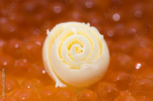 Slice of a butter and caviar photo