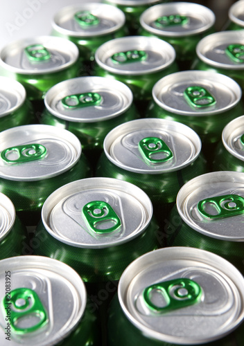 Aluminum cans with keys close-up, focus on center..
